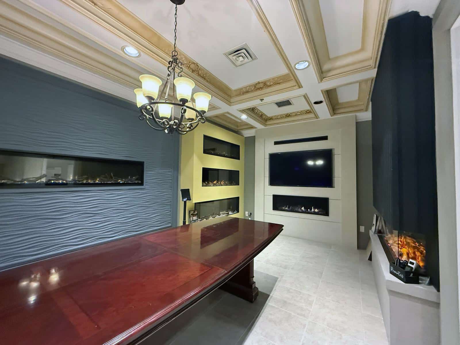 Fireplace and mantel combination on display at Omega Flames Woodbridge showroom