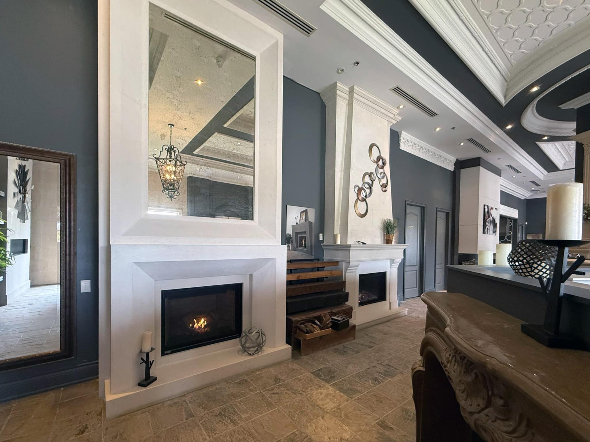 Fireplace and cast stone mantel detail at Omega Flames Woodbridge showroom