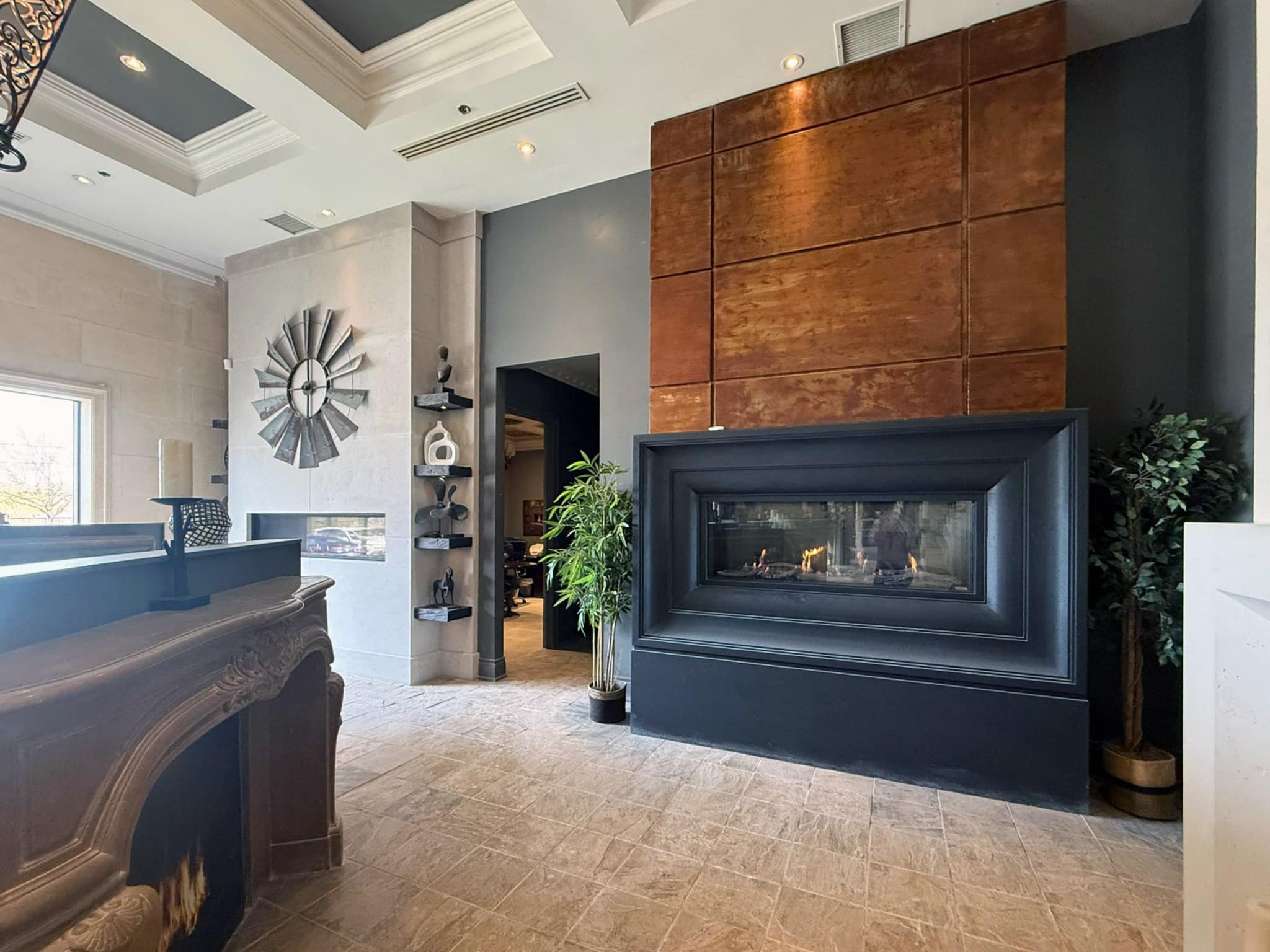 See-through gas fireplace display at Omega Flames Woodbridge
